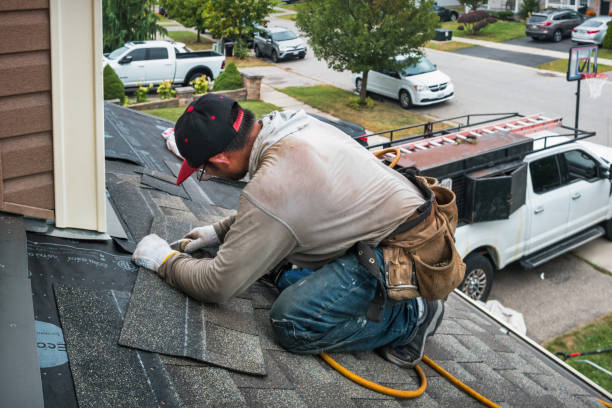 Professional Gutter Installation technician working in Riverside, MD